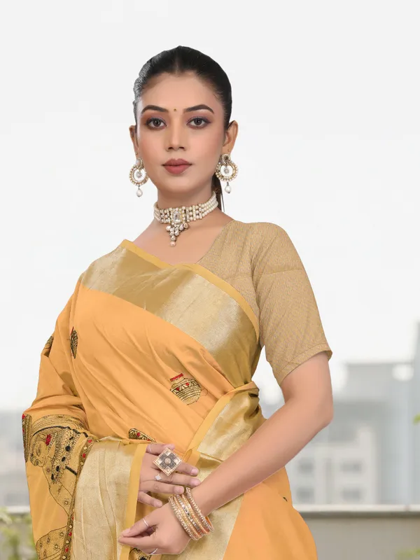 Mustard_Yellow_Matka_Silk_Portrait_Motif_Saree_For_Women