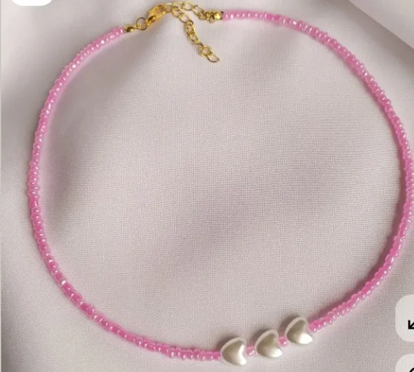 Pink_Beaded_Necklace_With_White_Heart-Shaped_Accents