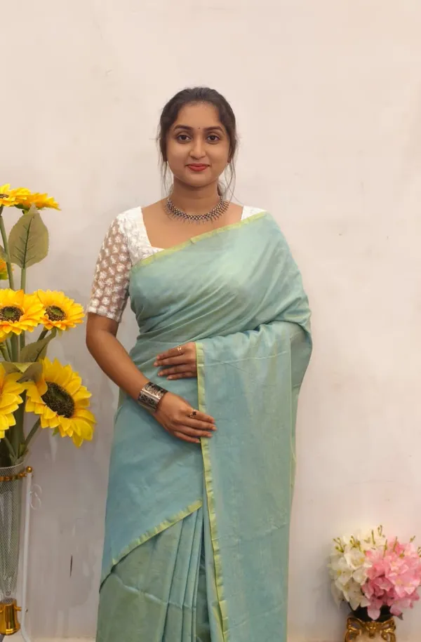 Mint_Green_Masrise_Cotton_Solid_Tassel_Border_Saree_For_Women