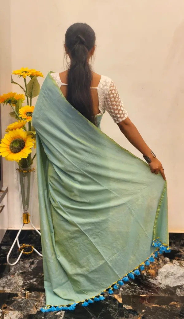 Mint_Green_Masrise_Cotton_Solid_Tassel_Border_Saree_For_Women