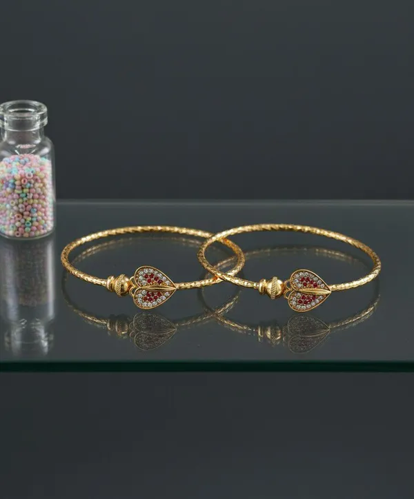 Gold_Tone_Heart_Motif_Stone_Studded_Bangles_for_Women