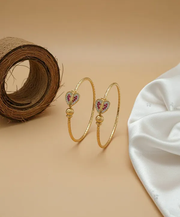 Gold_Tone_Heart_Motif_Stone_Studded_Bangles_for_Women