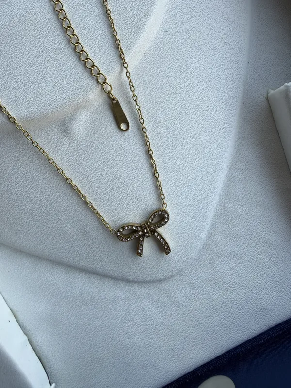 Gold_Stainless_Steel_Bow_Pendant_Necklace_For_Women