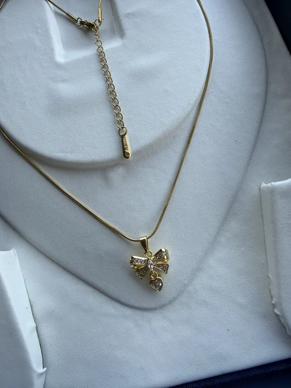 Gold_Stainless_Steel_Bow_Pendant_Necklace_For_Women