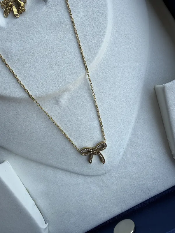 Gold_Stainless_Steel_Bow_Pendant_Necklace_For_Women