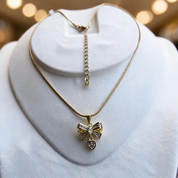 Gold_Stainless_Steel_Bow_Pendant_Necklace_For_Women