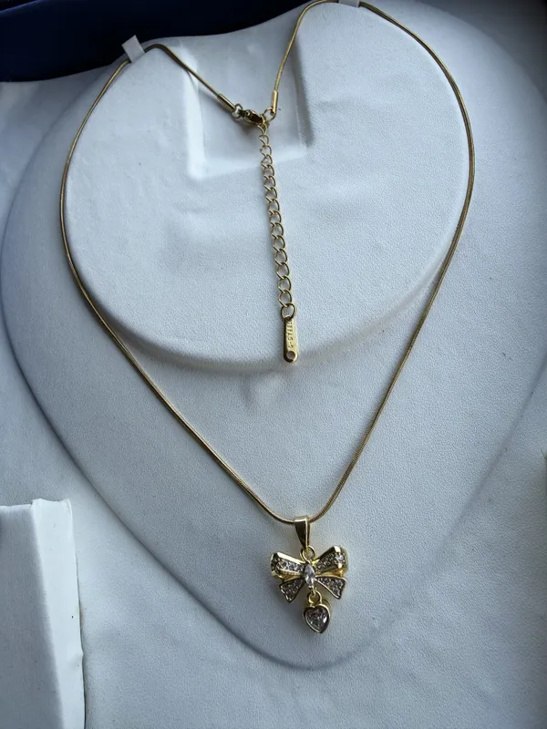 Gold_Stainless_Steel_Bow_Pendant_Necklace_For_Women