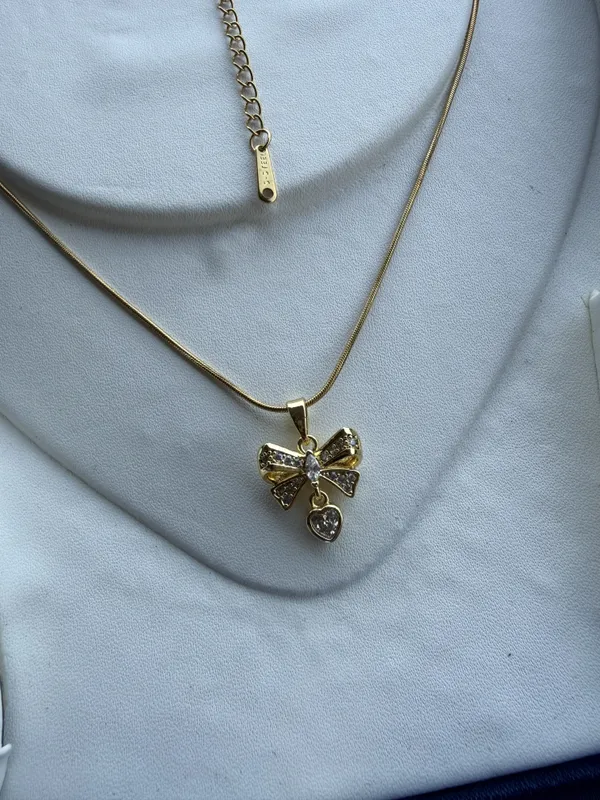 Gold_Stainless_Steel_Bow_Pendant_Necklace_For_Women