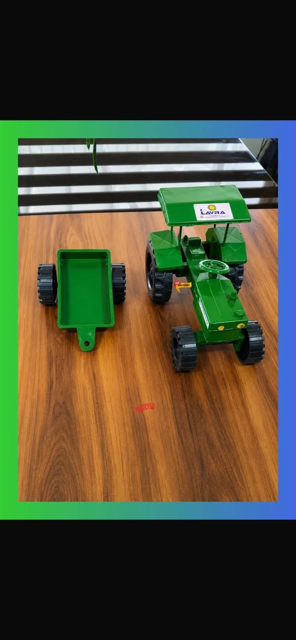 Green_Plastic_Toy_Tractor_With_Detachable_Trailer