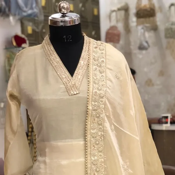 Suit_Set_for_Women_-_Ivory_Shimmer_with_Heavy_Hand_Work_Bottom_|_Wedding_Wear