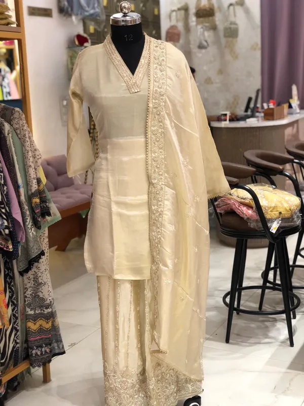 Suit_Set_for_Women_-_Ivory_Shimmer_with_Heavy_Hand_Work_Bottom_|_Wedding_Wear