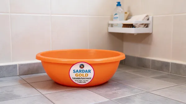 Orange_Plastic_Utility_Tub_For_Bathroom_&_Household_Use