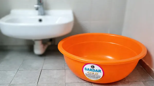 Orange_Plastic_Utility_Tub_For_Bathroom_&_Household_Use