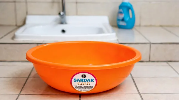 Orange_Plastic_Utility_Tub_For_Bathroom_&_Household_Use