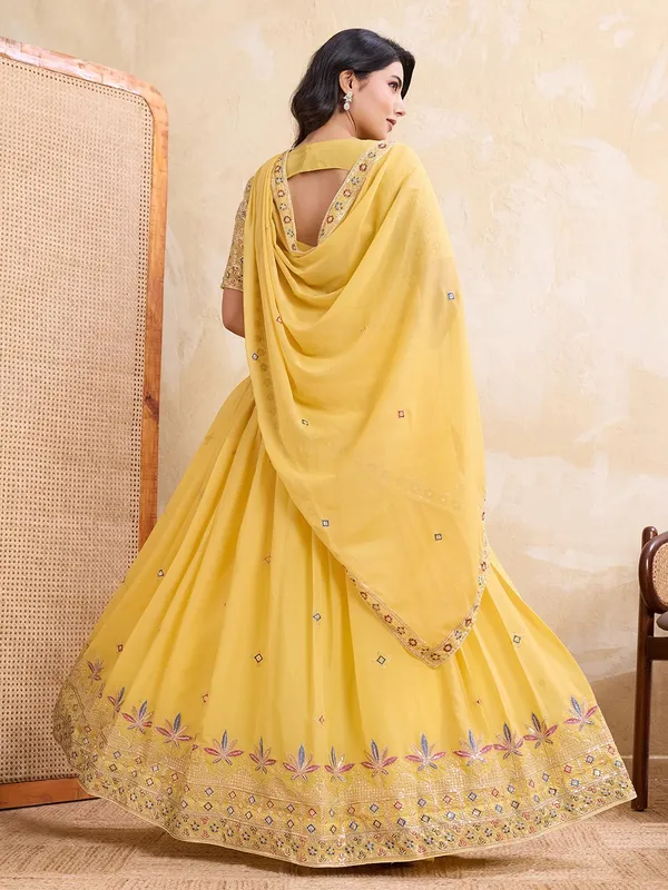 Elegant_Yellow_Georgette_Embroidered_Lehenga_Choli_Set_With_Matching_Blouse_And_A_Decorative_Dupatta