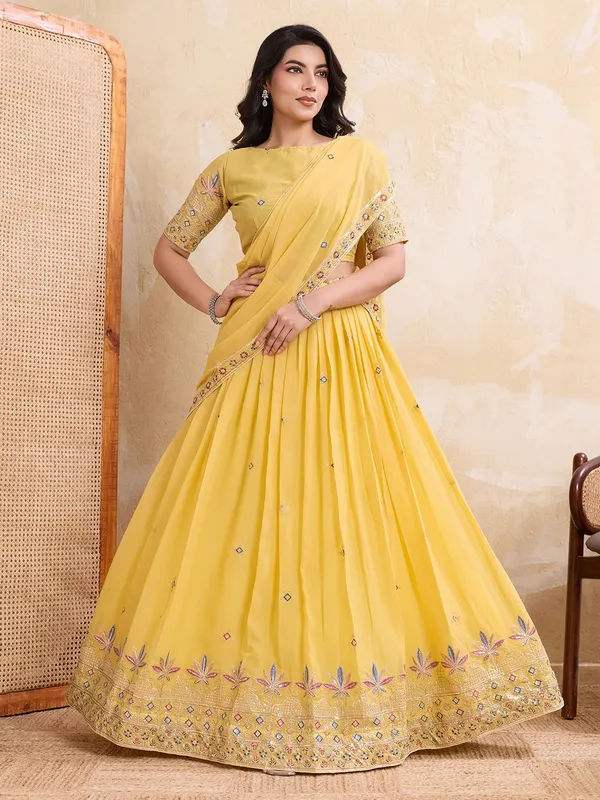 Elegant_Yellow_Georgette_Embroidered_Lehenga_Choli_Set_With_Matching_Blouse_And_A_Decorative_Dupatta