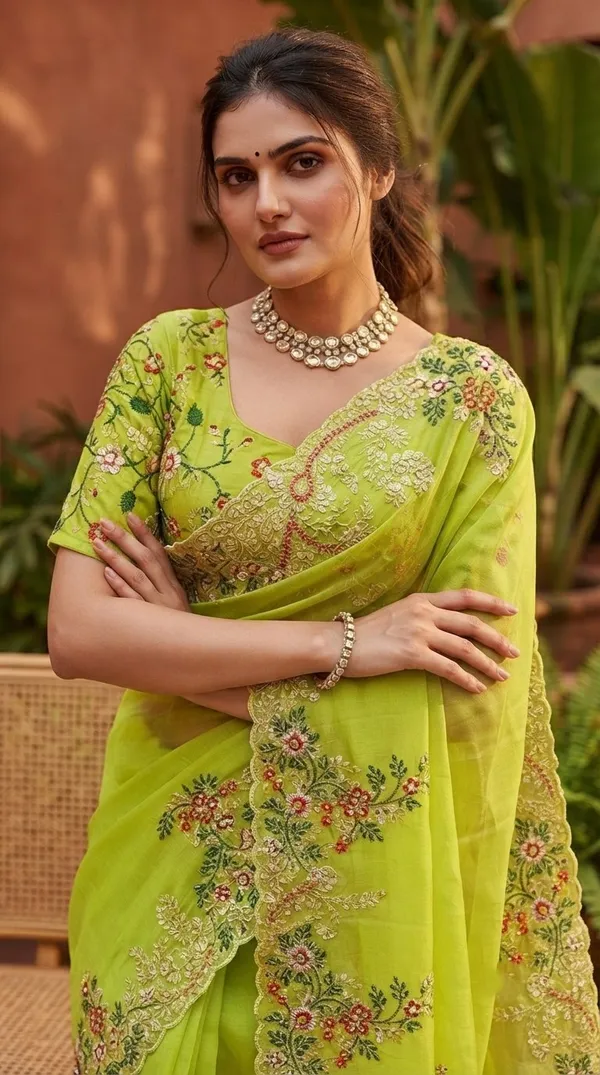 Green_Jimmy_Silk_Saree_Adorned_With_Intricate_Floral_Embroidery_And_A_Scalloped_Border