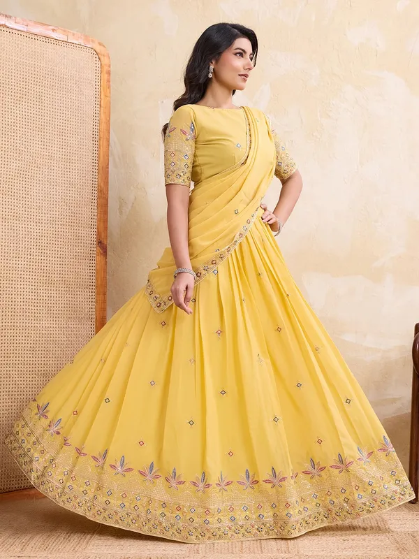 Elegant_Yellow_Georgette_Embroidered_Lehenga_Choli_Set_With_Matching_Blouse_And_A_Decorative_Dupatta