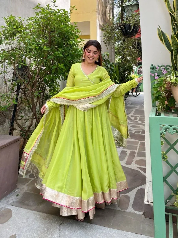 Green_Anarkali_Gown_Set_Crafted_From_Premium_Tabby_Organza_Silk,_Featuring_Delicate_Mirror_Hand_Work_And_Traditional_Gota_Patti_Lace_Detailing