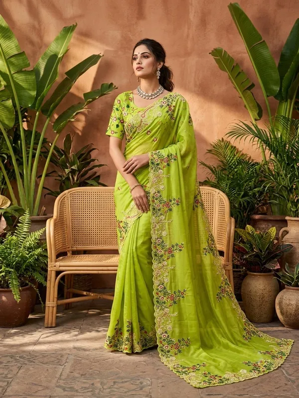 Green_Jimmy_Silk_Saree_Adorned_With_Intricate_Floral_Embroidery_And_A_Scalloped_Border