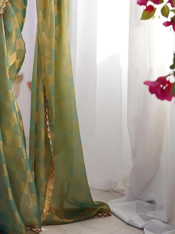 Innovative_Green_Premium_Party_Wear_Saree_For_Wedding_And_Reception_Wear