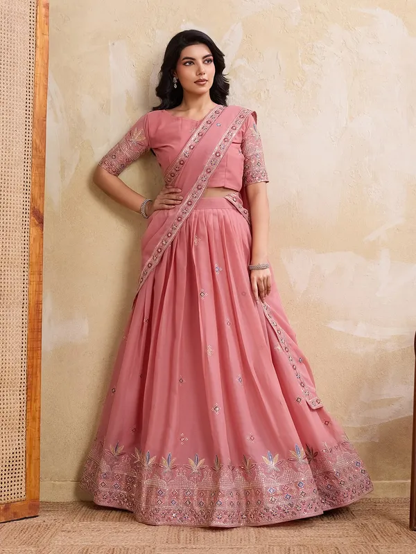 Elegant_Peach_Georgette_Embroidered_Lehenga_Choli_Set_With_Matching_Blouse_And_A_Decorative_Dupatta