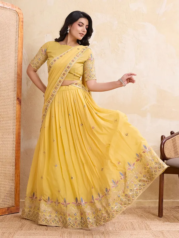 Elegant_Yellow_Georgette_Embroidered_Lehenga_Choli_Set_With_Matching_Blouse_And_A_Decorative_Dupatta