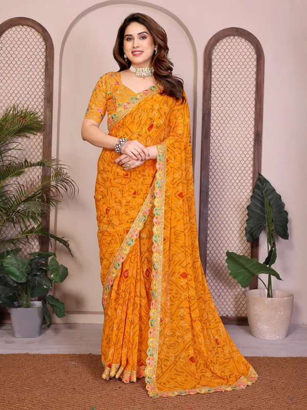 Agreeable_Yellow_Georgette_Bandhej_Print_With_Cutwork_Lace_Border_Saree_With_Mono_Banglory_Silk_Blouse