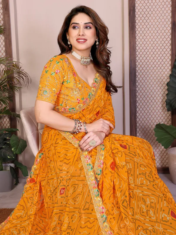 Agreeable_Yellow_Georgette_Bandhej_Print_With_Cutwork_Lace_Border_Saree_With_Mono_Banglory_Silk_Blouse