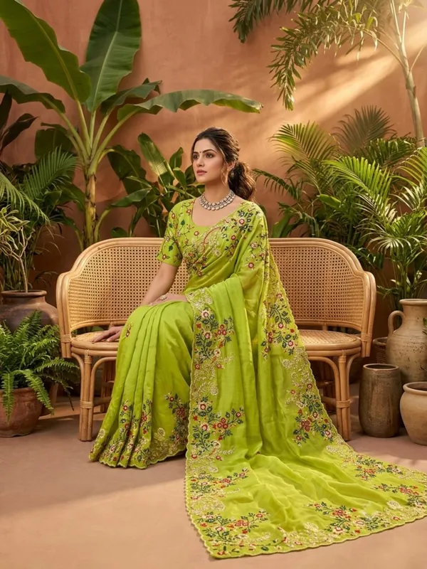 Green_Jimmy_Silk_Saree_Adorned_With_Intricate_Floral_Embroidery_And_A_Scalloped_Border