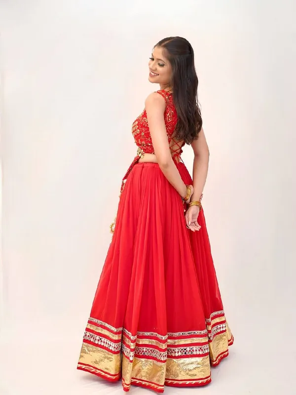 Bright_Red_Heavy_Real_Mirror_Lace_And_Lampi_Work_Flared_Lehenga_With_Embroidered_Long_Kurti_Blouse