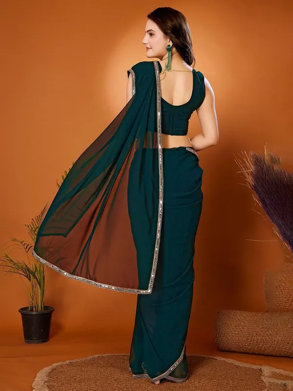 Deep_Teal_Green_Georgette_Saree_With_Elegant_Silver_Lace_Border_Default_Title