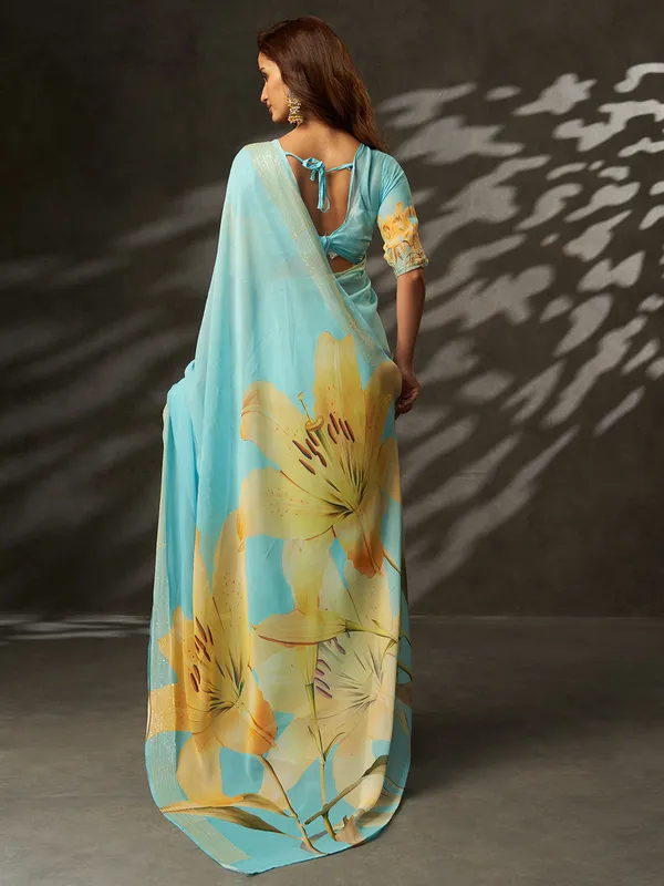 Aqua_Blue_Printed_Georgette_Saree_With_Silver_Woven_Border_Default_Title