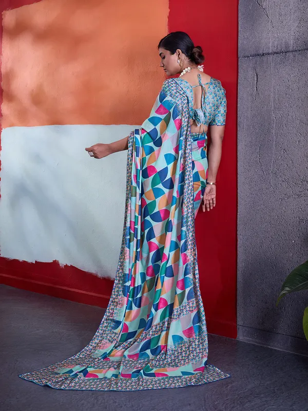 Aqua_Blue_Printed_Crepe_Saree_With_Multicolor_Printed_Border_Default_Title