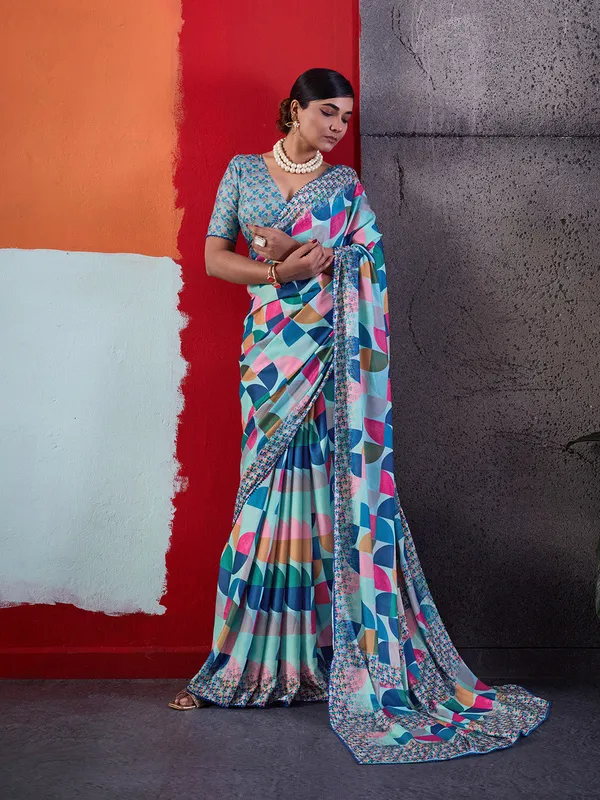 Aqua_Blue_Printed_Crepe_Saree_With_Multicolor_Printed_Border_Default_Title