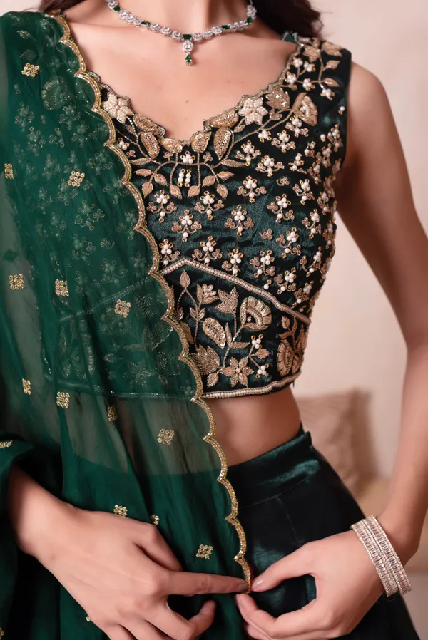 Ethnivo_Emerald_Green_Organza_Party_Wear_Lehenga_Choli_With_Golden_Border