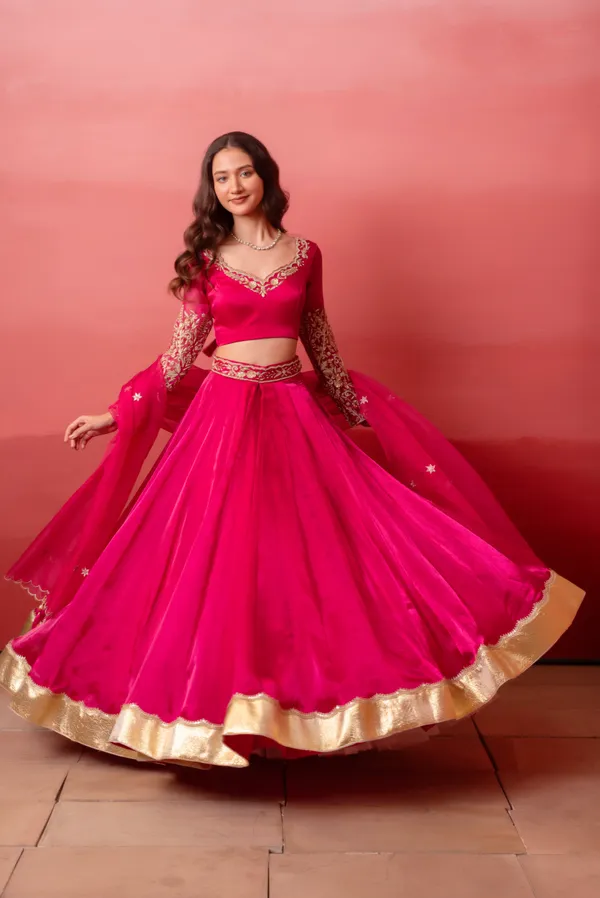 Ethnivo_Hot_Pink_Organza_Party_Wear_Lehenga_Choli_With_Golden_Border