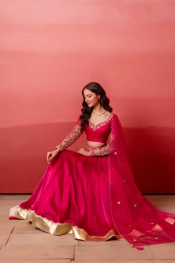 Ethnivo_Hot_Pink_Organza_Party_Wear_Lehenga_Choli_With_Golden_Border