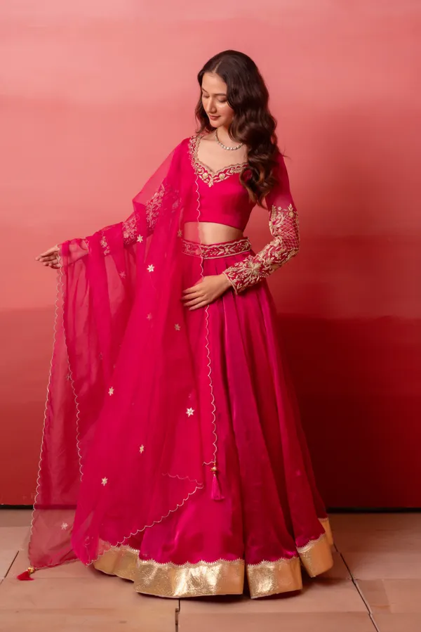 Ethnivo_Hot_Pink_Organza_Party_Wear_Lehenga_Choli_With_Golden_Border