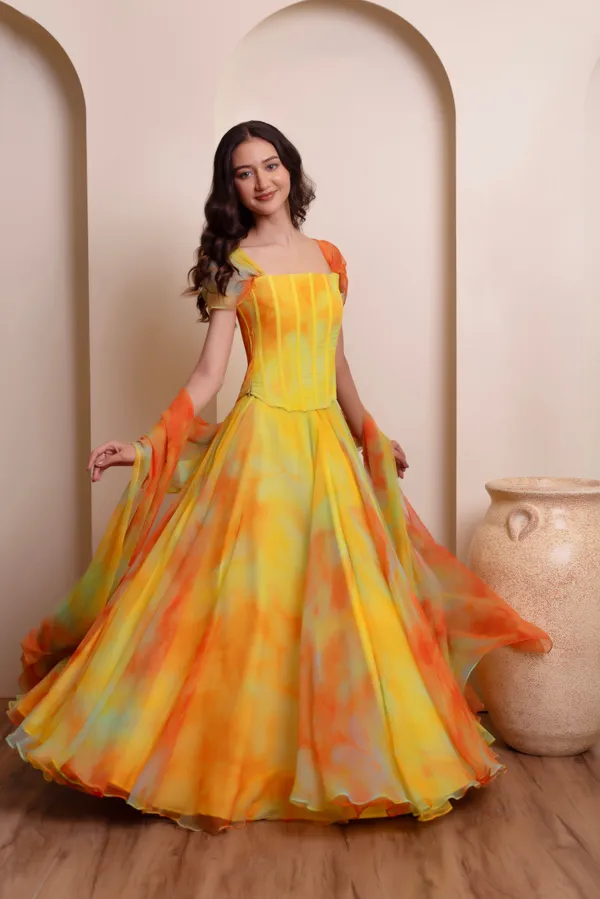 Ethnivo_Yellow_Orange_Chiffon_Party_Wear_Lehenga_Choli_With_Orange_Border
