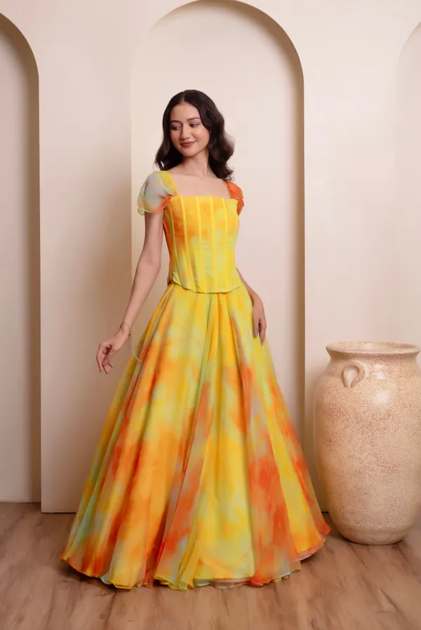 Ethnivo_Yellow_Orange_Chiffon_Party_Wear_Lehenga_Choli_With_Orange_Border