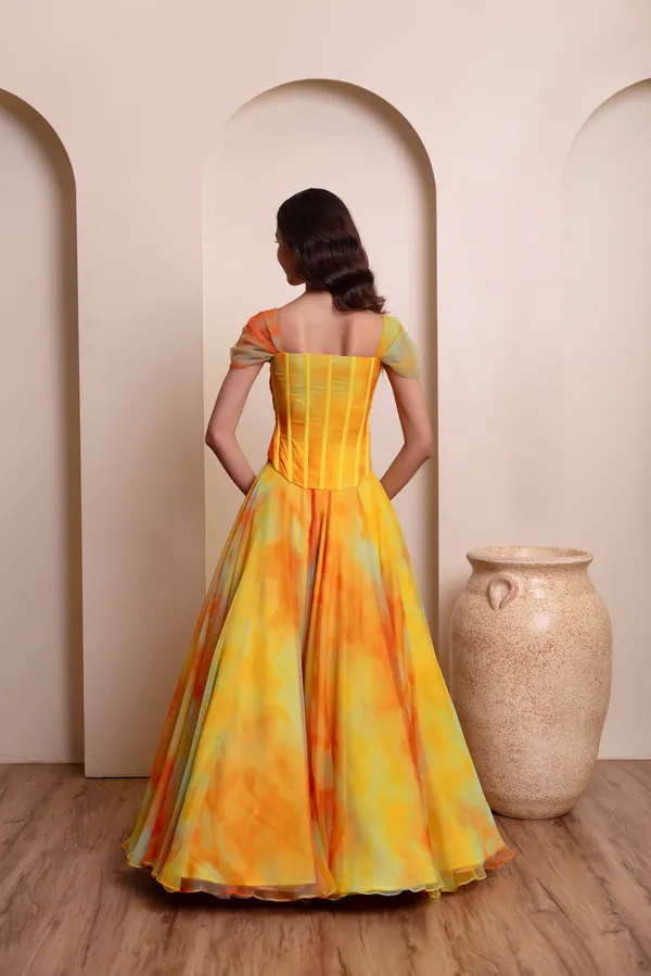 Ethnivo_Yellow_Orange_Chiffon_Party_Wear_Lehenga_Choli_With_Orange_Border