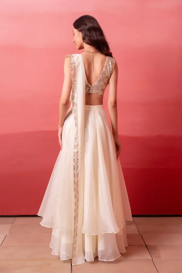 Ivory_White_Organza_Party_Wear_Lehenga_Choli_With_Golden_Embroidered_Border