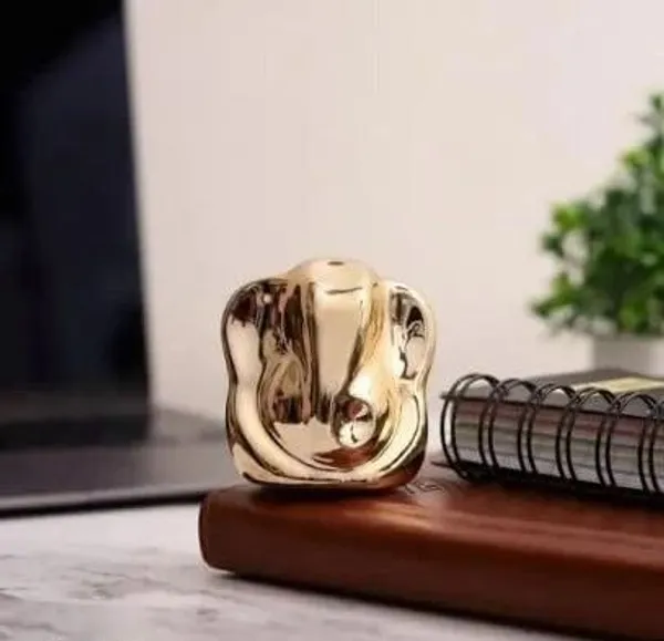 _Modern_Golden_Lord_Ganesha_Idol_–_Abstract_Metal_Finish_Ganpati_Showpiece_Decorative_Showpiece__-__6_cm_(Polyresin,_Gold)