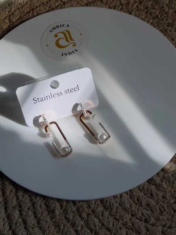 Perl_With_Studded_Earrings_Default_Title