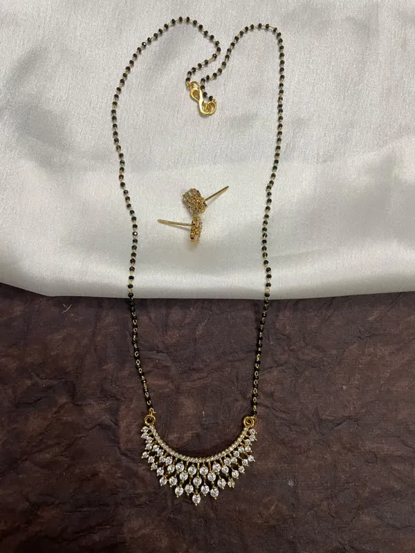 Sparkling_Daimond_pendant_Black_bead_mangalsutra_with_earrings
