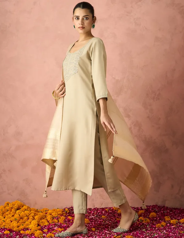 Elevate_your_ethnic_wardrobe_with_this_elegant_Hritika_Beige_Cotton__Zari_Embroidered_Kurta_With_Trouser_&_Dupatta_Set,_designed_to_blend_timeless_craftsmanship_with_contemporary_sophistication.