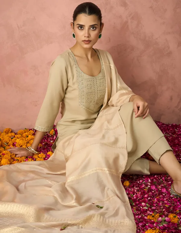 Elevate_your_ethnic_wardrobe_with_this_elegant_Hritika_Beige_Cotton__Zari_Embroidered_Kurta_With_Trouser_&_Dupatta_Set,_designed_to_blend_timeless_craftsmanship_with_contemporary_sophistication.