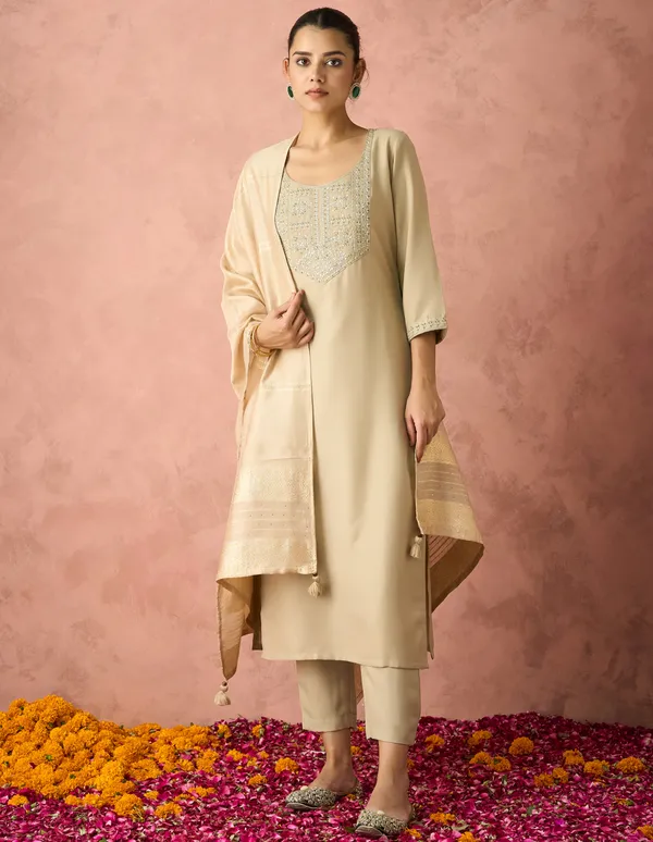 Elevate_your_ethnic_wardrobe_with_this_elegant_Hritika_Beige_Cotton__Zari_Embroidered_Kurta_With_Trouser_&_Dupatta_Set,_designed_to_blend_timeless_craftsmanship_with_contemporary_sophistication.