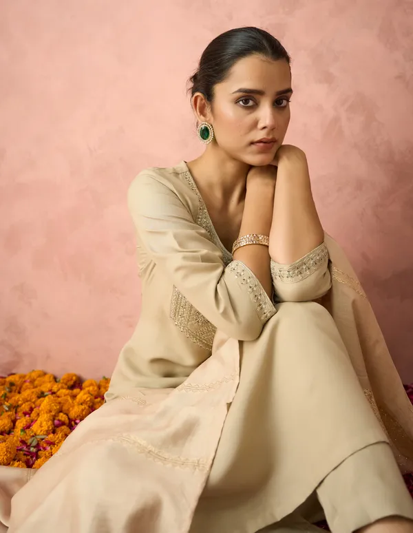 Elevate_your_ethnic_wardrobe_with_this_elegant_Hritika_Beige_Cotton__Zari_Embroidered_Kurta_With_Trouser_&_Dupatta_Set,_designed_to_blend_timeless_craftsmanship_with_contemporary_sophistication.